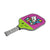 White Background Image: JOOLA x BRITTO paddle, grey handle, lime green and purple paddle face with an image of a cat in BRITTO art stye.