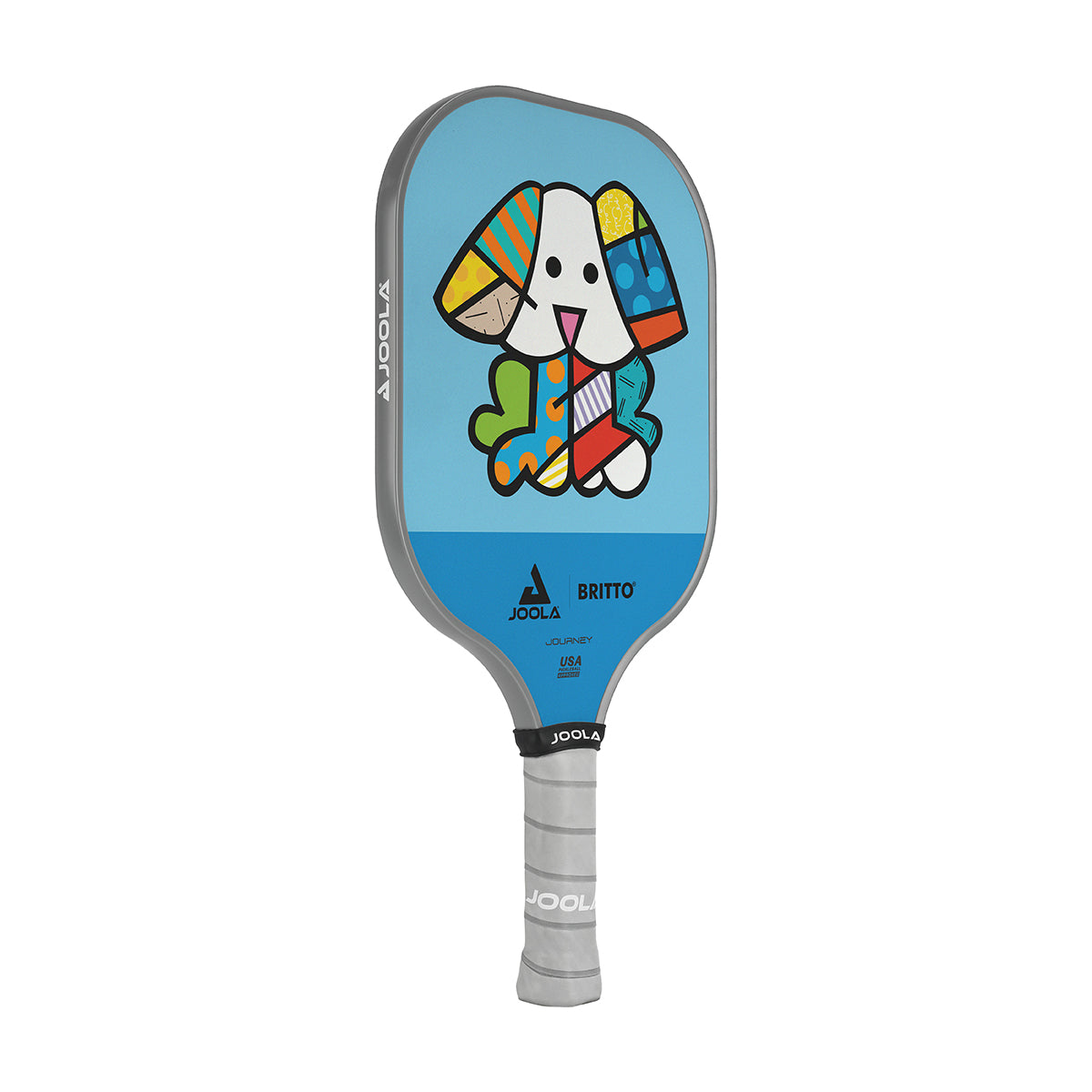 White Background Image: JOOLA x BRITTO paddle, grey handle, blue and light blue paddle face with an image of a dog.