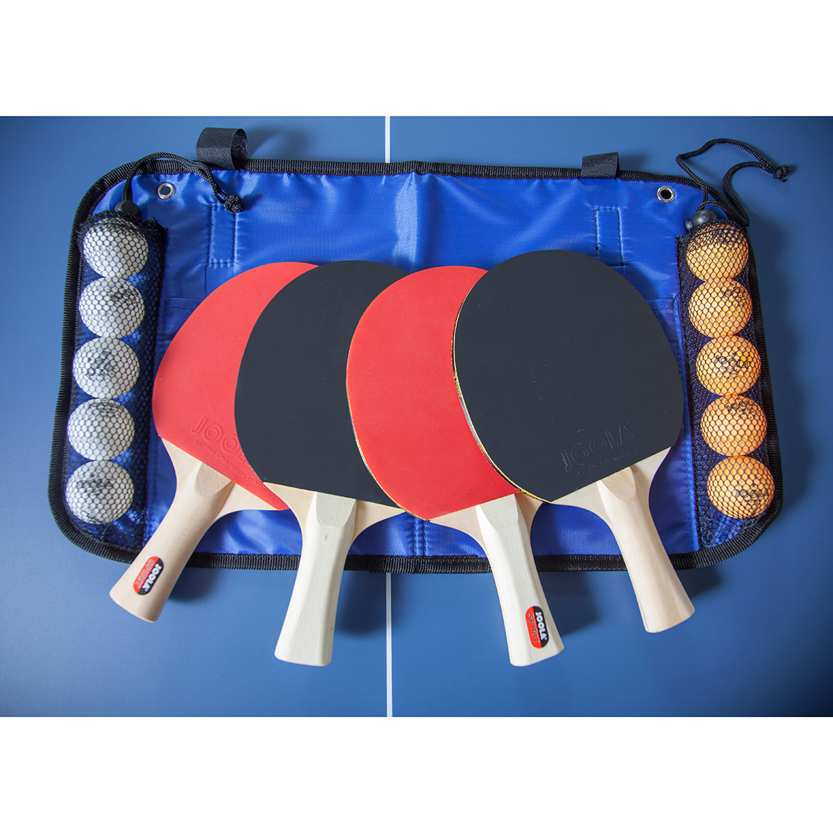 Product image of a set of four JOOLA spirit table tennis rackets, carrying case and table tennis balls.