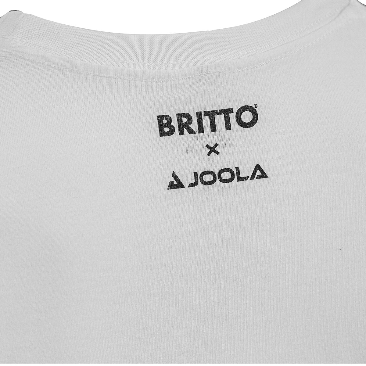 White Background Image: Back of BRITTO x JOOLA tee shirt. BRITTO x JOOLA logo on the back side of the shirt near the neck.