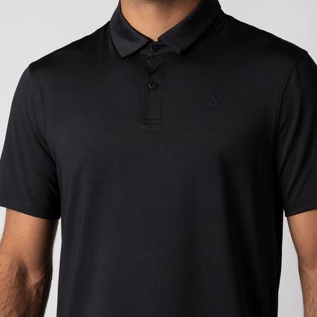 Close up of the JOOLA Men's Club Polo showing the two button self-extension placket w/ collar strand, black.