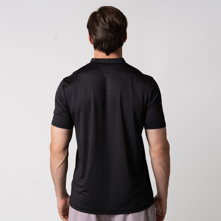 Image showing the back of a model wearing a JOOLA Men's Court Polo, Black.