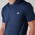 Close up image of the heat sealed JOOLA trinity logo on the JOOLA Men's Court Polo. Navy.