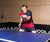 Image of Joerg Rosskopf playing table tennis on a JOOLA table.