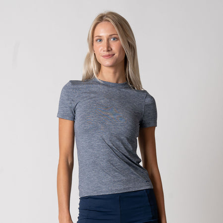 Female model wearing the JOOLA Women's Club Short Sleeve Shirt, Navy Heather.