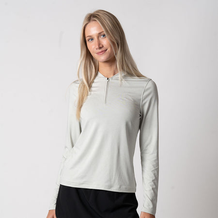 Image showing a female model wearing a JOOLA Women's Quarter Zip Pullover, Gravity Gray.